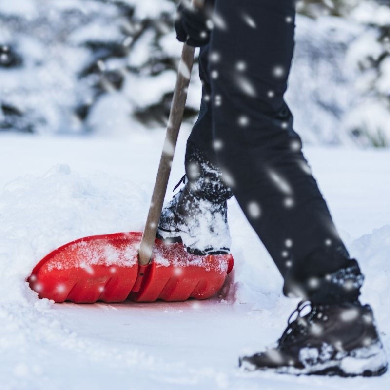 person shoveling snow