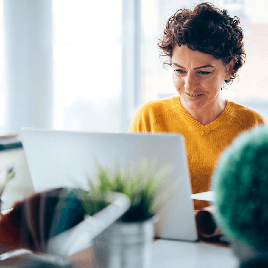 woman using desktop computer